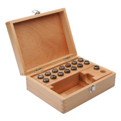 Set of tweezers in wooden box